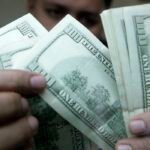 Dólar dispara e fecha próximo de r$ 5,17 pressionado por exterior e eleições