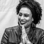 Filha denuncia ataques racistas a Marielle em grupo da PUC-Rio